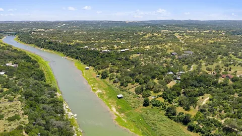 a view of city and swimming pool