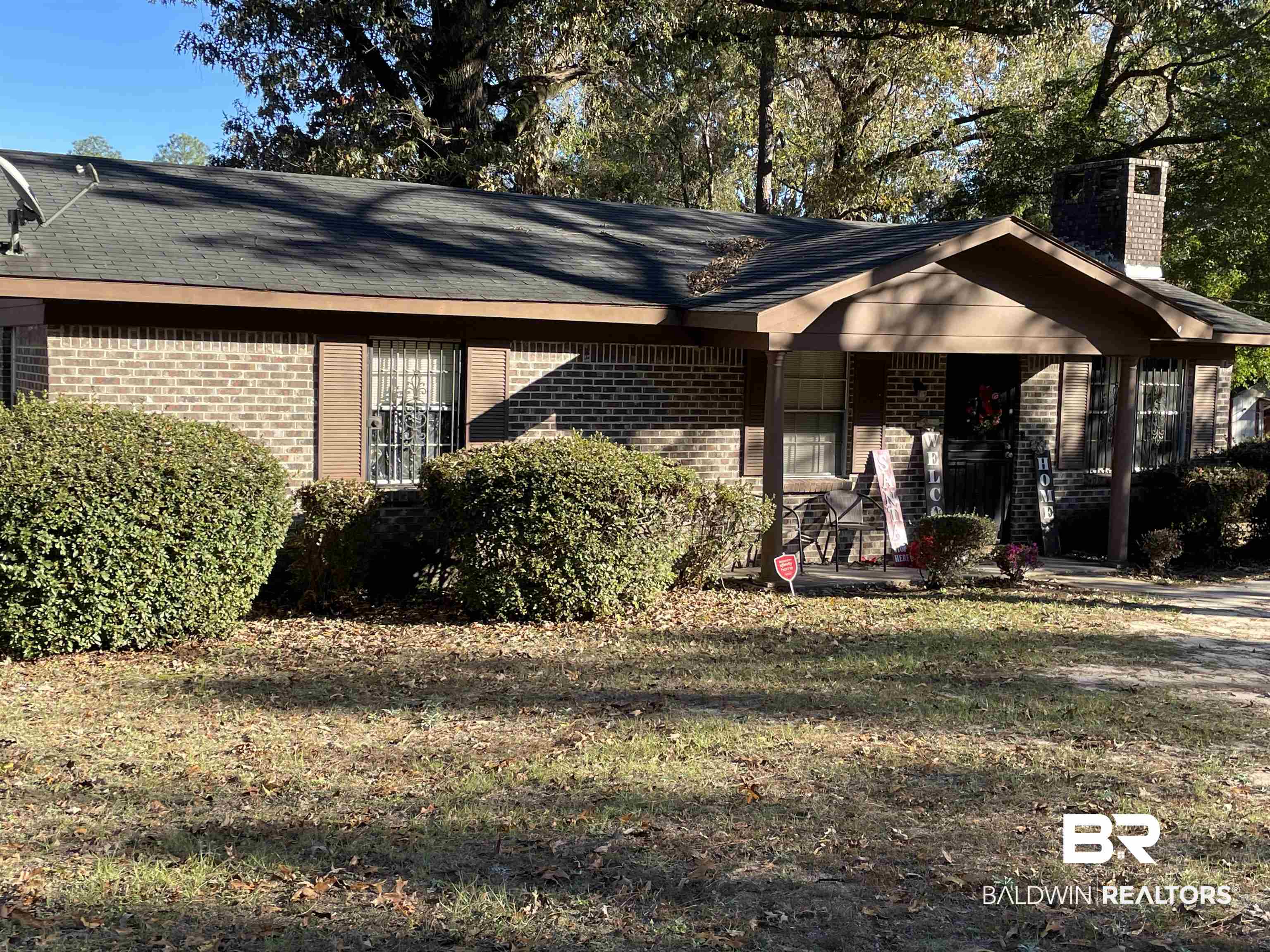 View of home's exterior with a lawn
