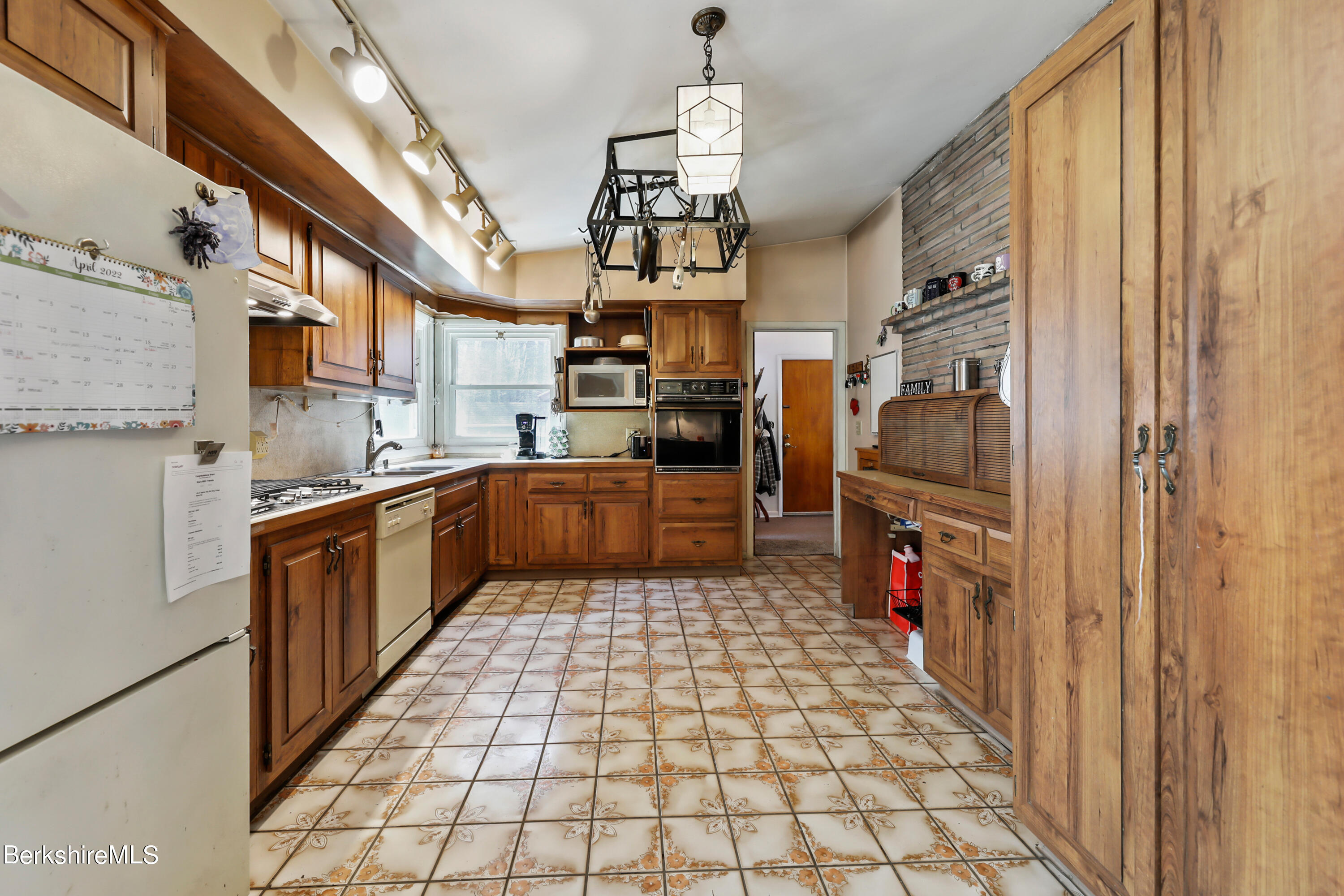 36 Lenox Road West Stockbridge, MA 01266 - Photo 12 of 30 a kitchen with stainless steel appliances granite countertop a refrigerator a sink dishwasher and a stove