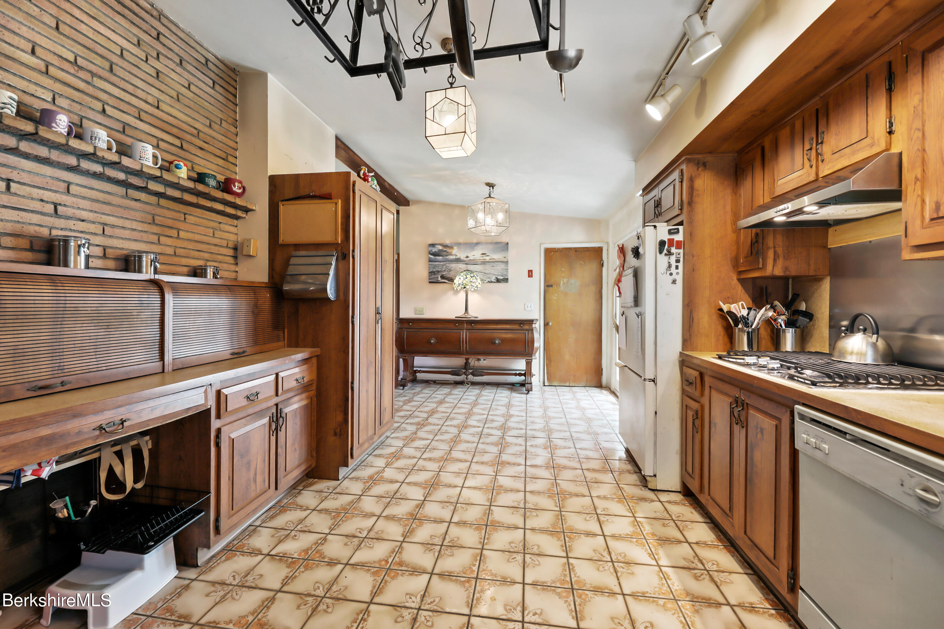 36 Lenox Road West Stockbridge, MA 01266 - Photo 15 of 30 a large kitchen with stainless steel appliances granite countertop a stove and cabinets