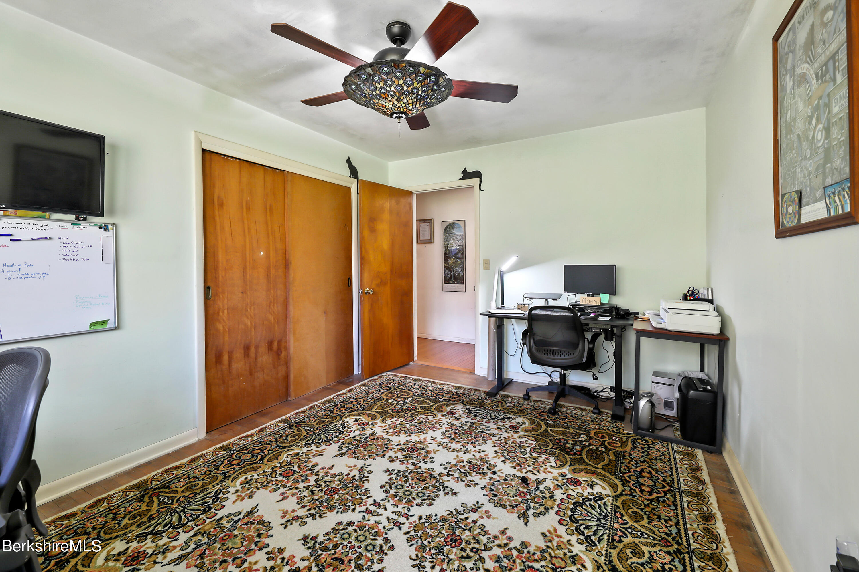 36 Lenox Road West Stockbridge, MA 01266 - Photo 22 of 30 a workspace with wooden floor and a window