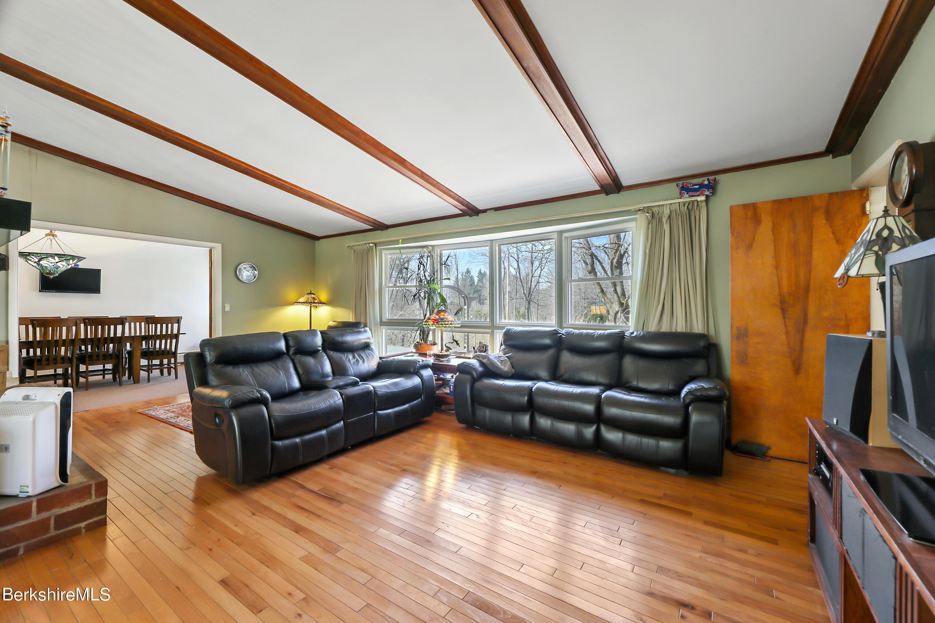 36 Lenox Road West Stockbridge, MA 01266 - Photo 5 of 30 a living room with furniture and a flat screen tv