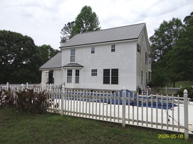 144 Old Sardis Church Road Clayton, AL 36016 - Photo 6 of 34 a view of a house with wooden fence