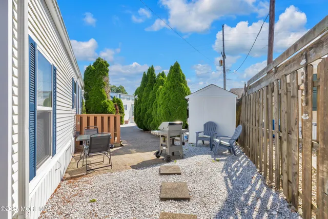 a living room with patio furniture