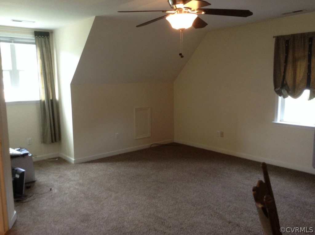 5412 Takach Road Prince George, VA 23875 - Photo 19 of 24 a view of a livingroom with a ceiling fan and window