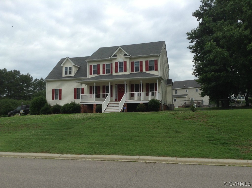 5412 Takach Road Prince George, VA 23875 - Photo 24 of 24 a front view of a house with a garden