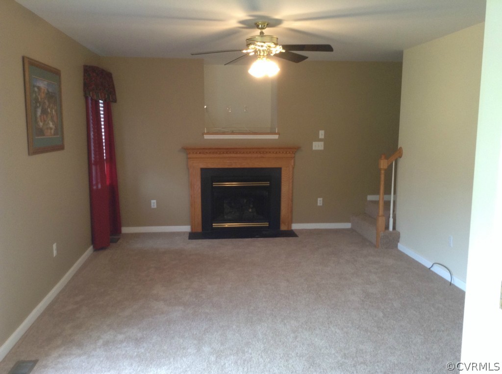 5412 Takach Road Prince George, VA 23875 - Photo 6 of 24 a view of empty room with a fireplace