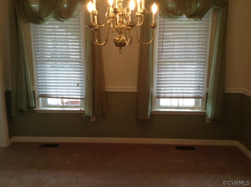 5412 Takach Road Prince George, VA 23875 - Photo 7 of 24 a view of a livingroom with an empty space and a window