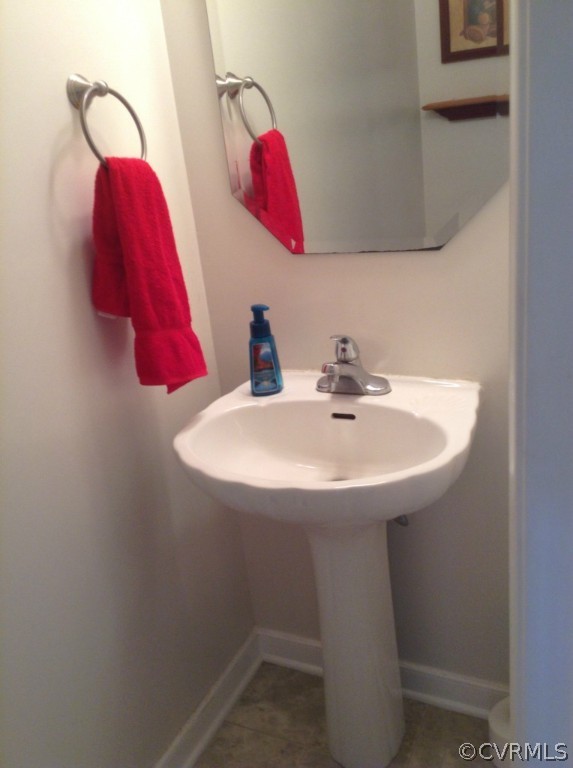 5412 Takach Road Prince George, VA 23875 - Photo 10 of 24 a bathroom with a sink and a mirror