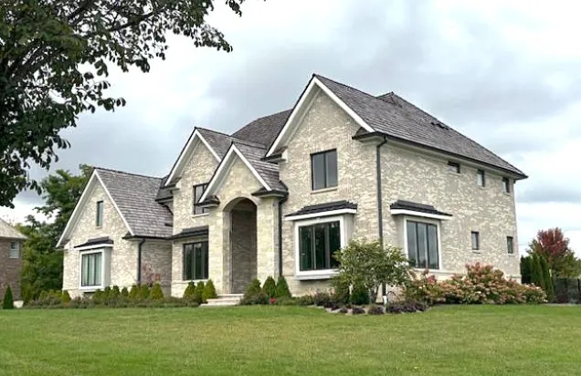 front view of a house with a yard