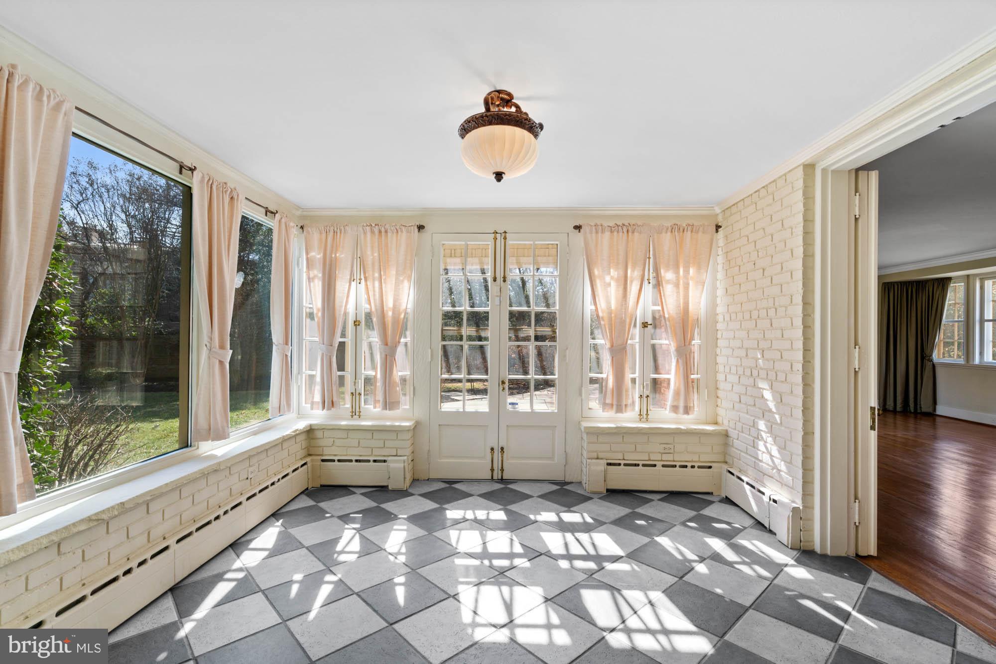 7 Charlcote Place Baltimore, MD 21218 - Photo 29 of 88 a bathroom with a bathtub and a large window