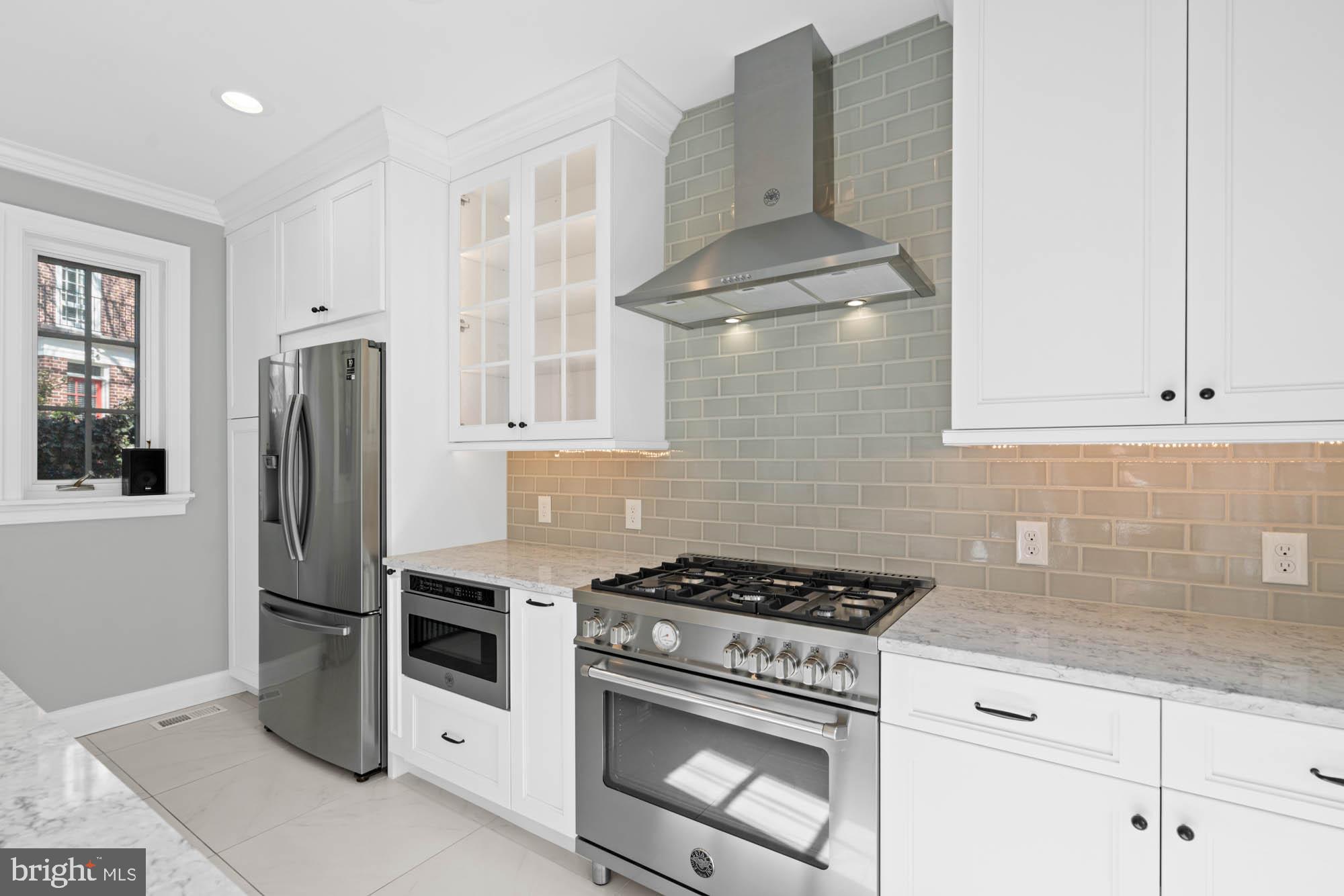 7 Charlcote Place Baltimore, MD 21218 - Photo 43 of 88 a kitchen with stainless steel appliances granite countertop a stove and a refrigerator