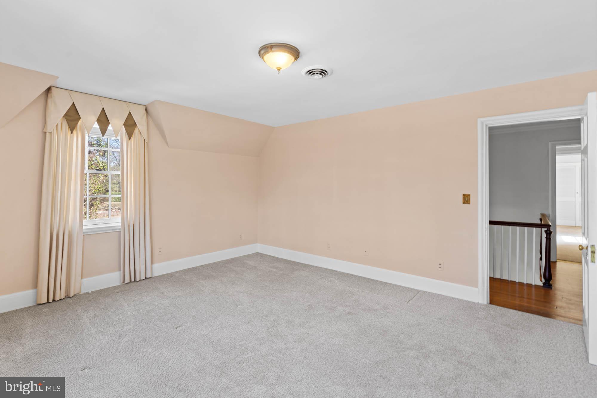 7 Charlcote Place Baltimore, MD 21218 - Photo 65 of 88 an empty room with windows