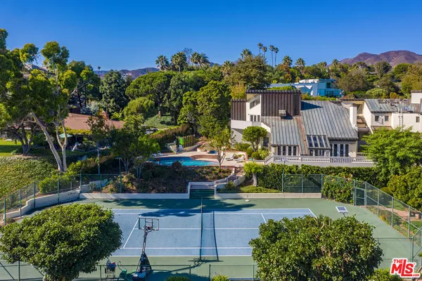 a view of a table and chairs in patio