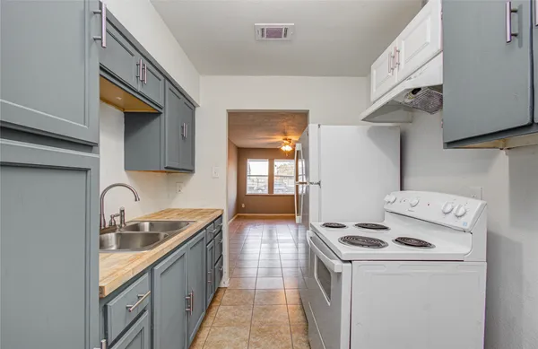 a bathroom with a toilet and a sink