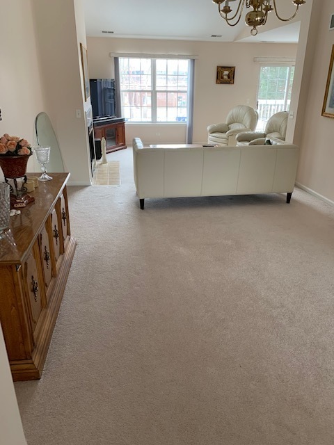 103 Bay Drive Itasca, IL 60143 - Photo 4 of 12 a living room with furniture and a window