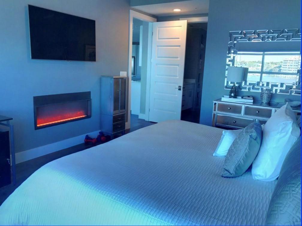 211 Durango Road, Unit 617 Destin, FL 32541 - Photo 16 of 56 a bedroom with a bed and a television