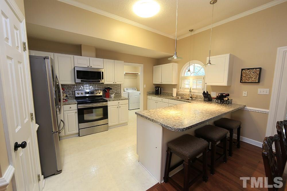 4312 Emmit Drive Raleigh, NC 27604 - Photo 8 of 21 Peninsula island is great for entertaining!