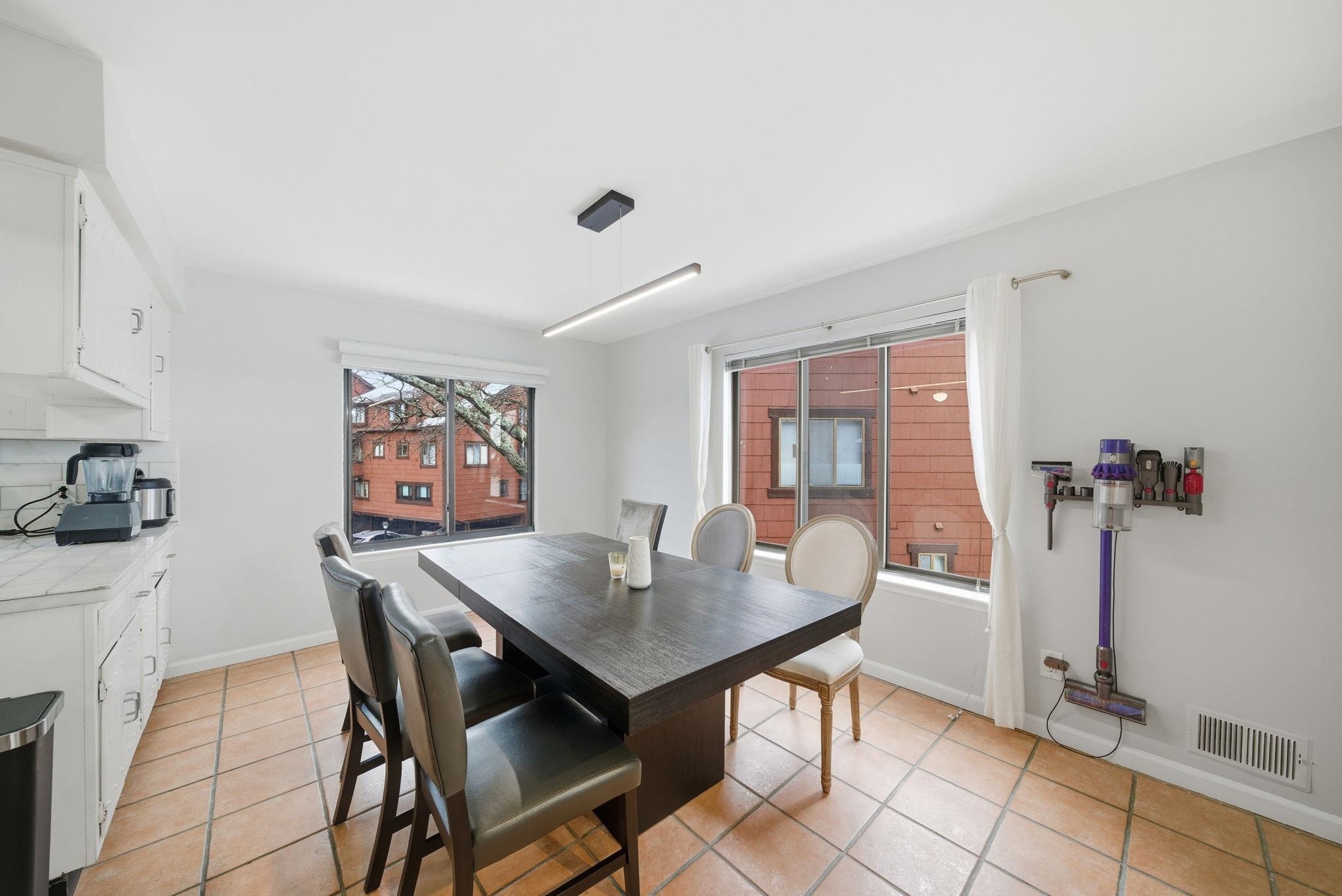 274 Sunset Key, Unit 274 Secaucus, NJ 07094 - Photo 12 of 50 a view of a dining room with furniture
