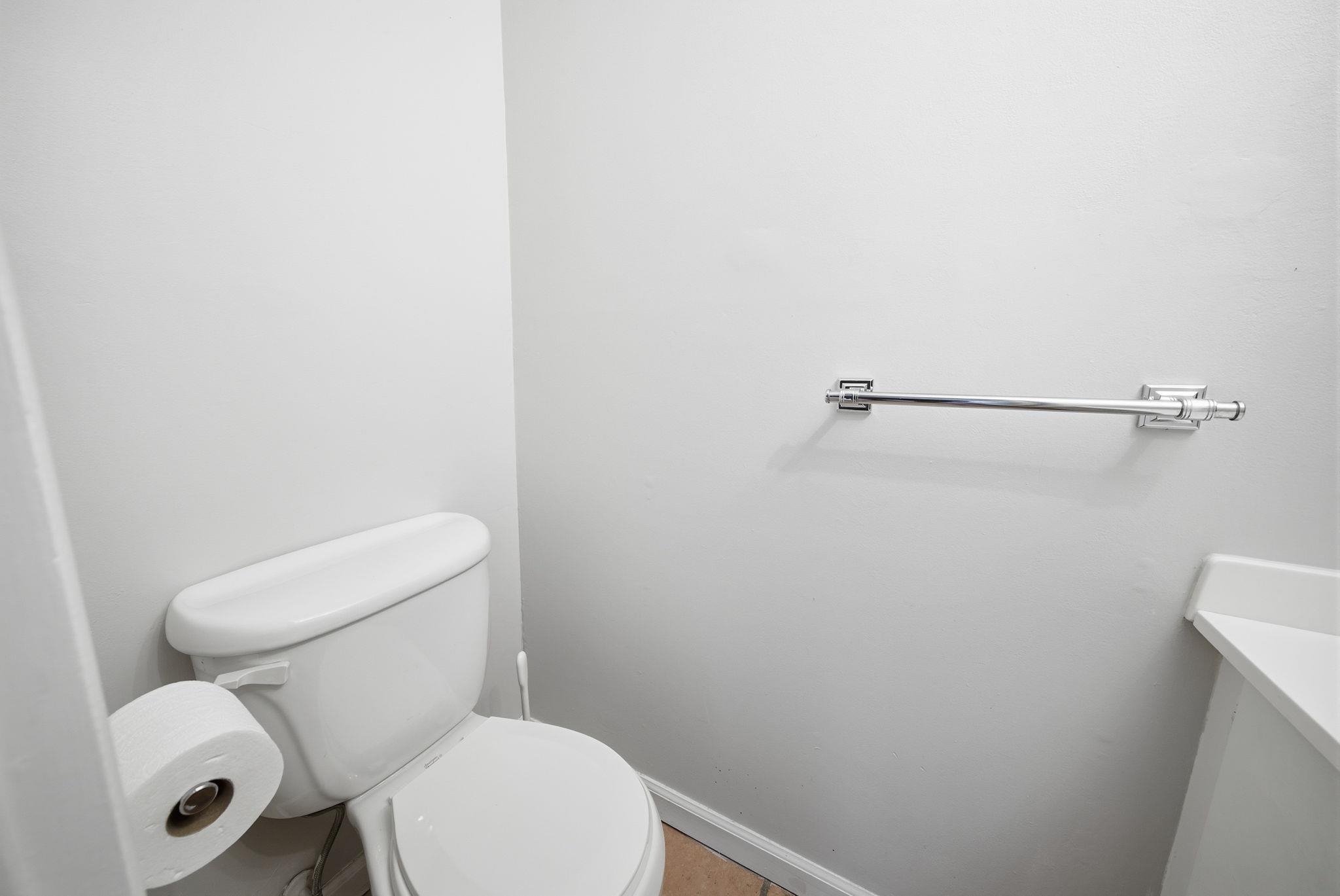 274 Sunset Key, Unit 274 Secaucus, NJ 07094 - Photo 18 of 50 a white toilet sitting next to a shower