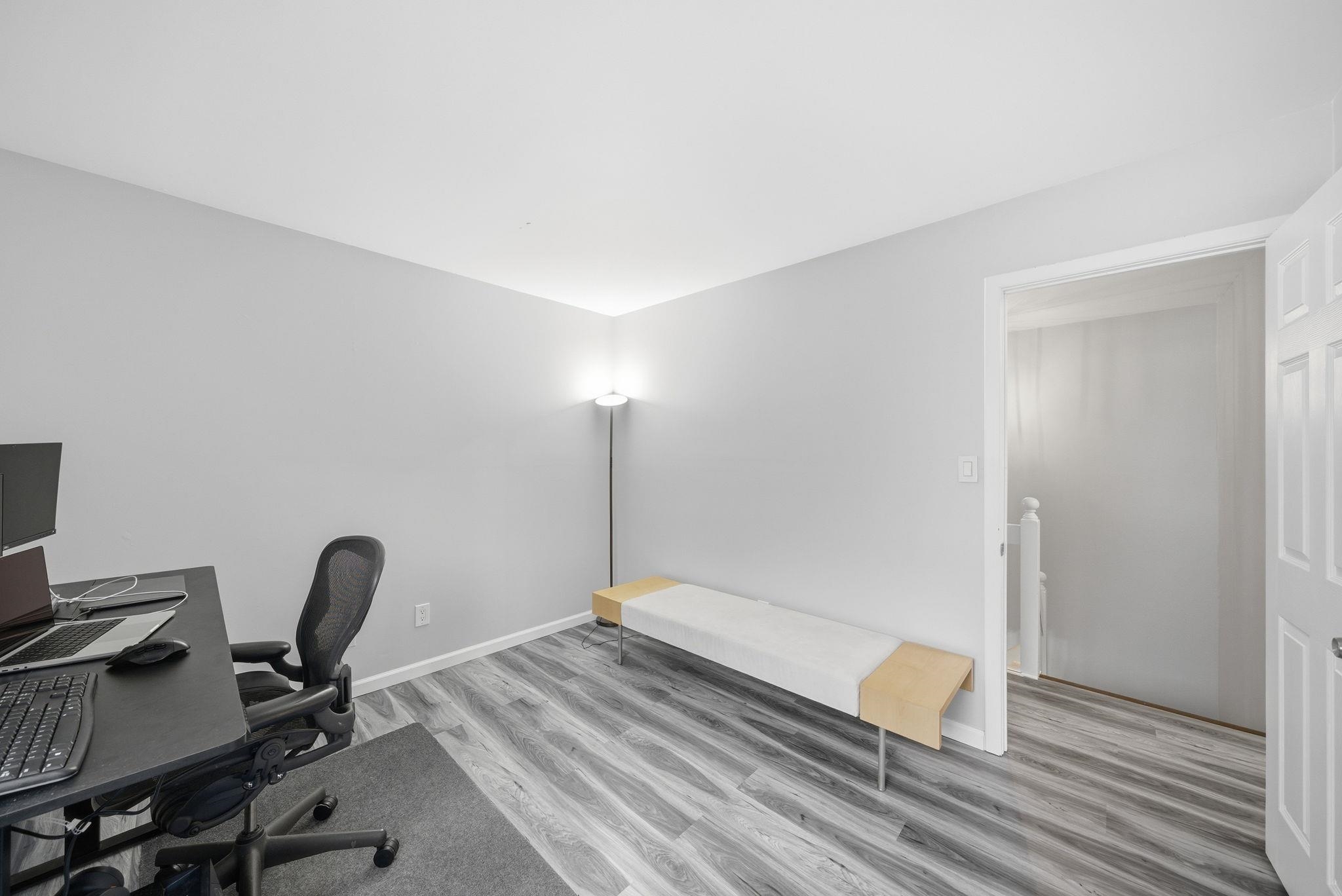 274 Sunset Key, Unit 274 Secaucus, NJ 07094 - Photo 32 of 50 a view of workspace with wooden floor windows