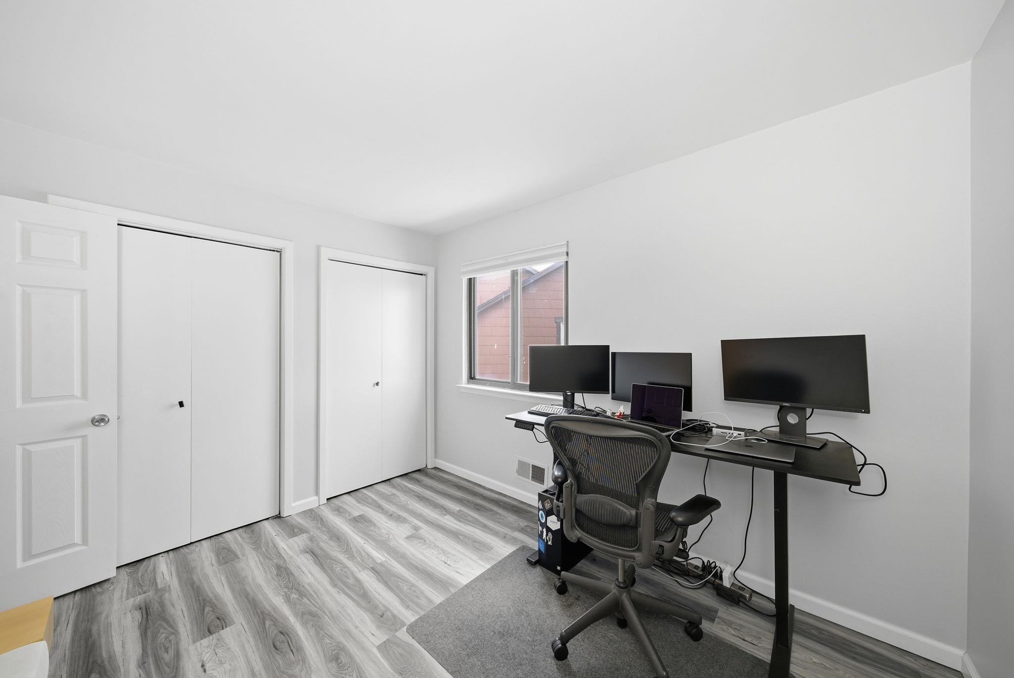 274 Sunset Key, Unit 274 Secaucus, NJ 07094 - Photo 33 of 50 a view of a workspace with furniture and a window