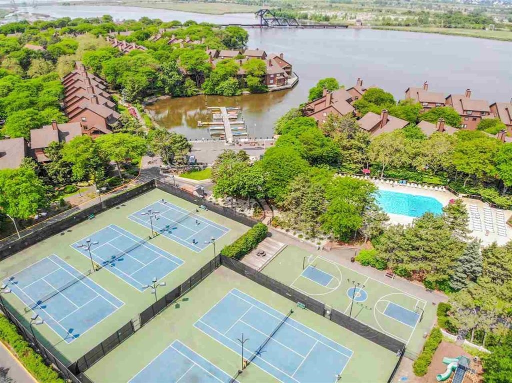 274 Sunset Key, Unit 274 Secaucus, NJ 07094 - Photo 49 of 50 an aerial view of a house with a yard and lake view