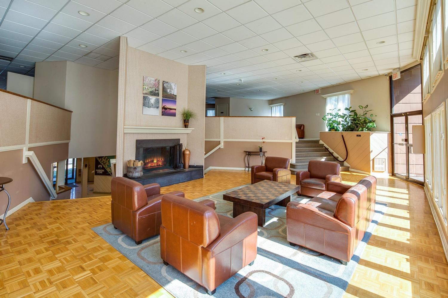 274 Sunset Key, Unit 274 Secaucus, NJ 07094 - Photo 50 of 50 a living room with furniture fireplace and a flat screen tv