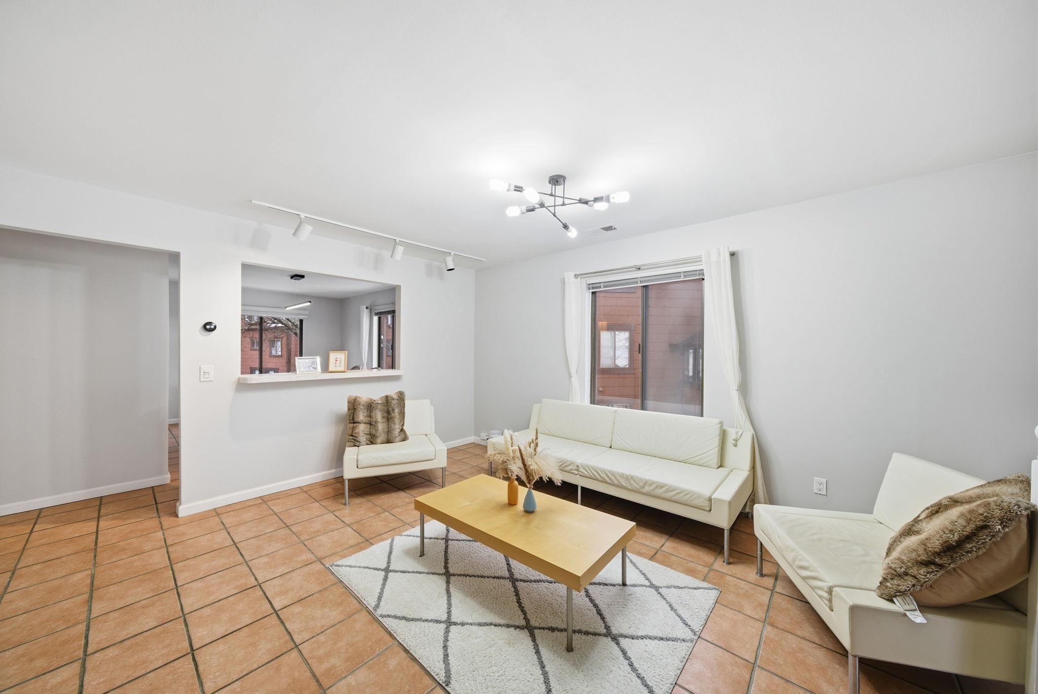 274 Sunset Key, Unit 274 Secaucus, NJ 07094 - Photo 9 of 50 a bedroom with furniture and wooden floor