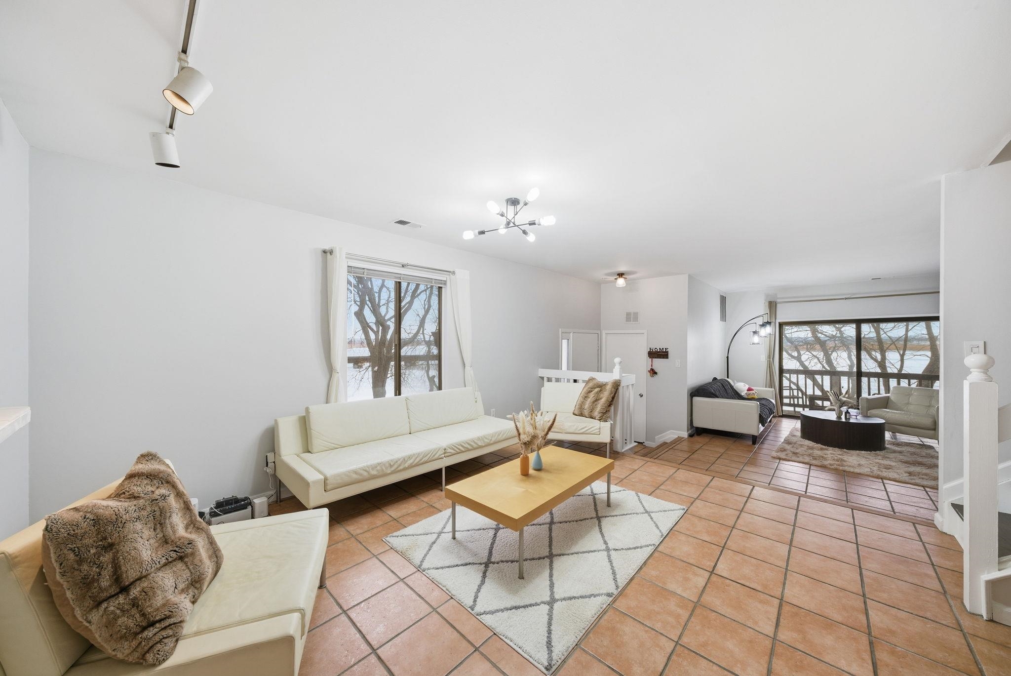 274 Sunset Key, Unit 274 Secaucus, NJ 07094 - Photo 10 of 50 a living room with furniture and a window