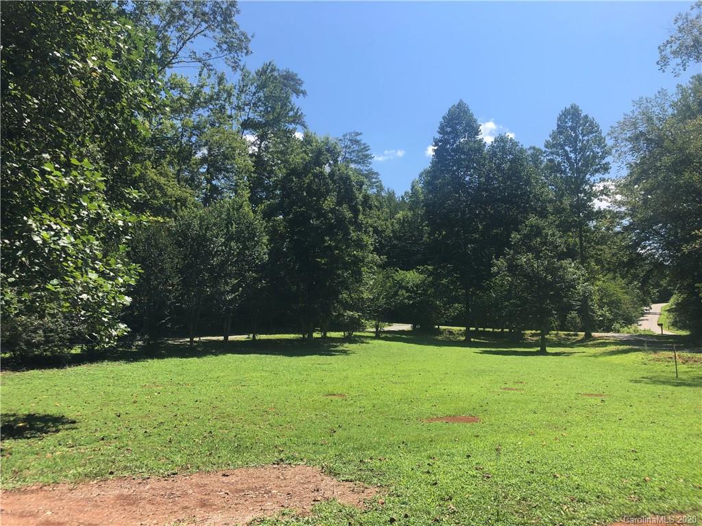 1117 Ponder Road Mill Spring, NC 28756 - Photo 4 of 39 a view of outdoor space with green field and trees