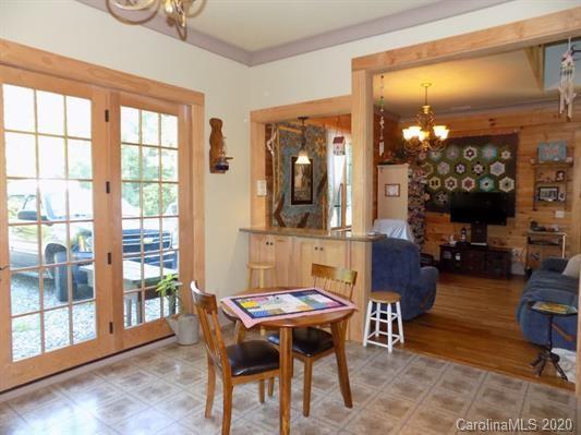 1117 Ponder Road Mill Spring, NC 28756 - Photo 7 of 39 a view of a livingroom with furniture window and outside view