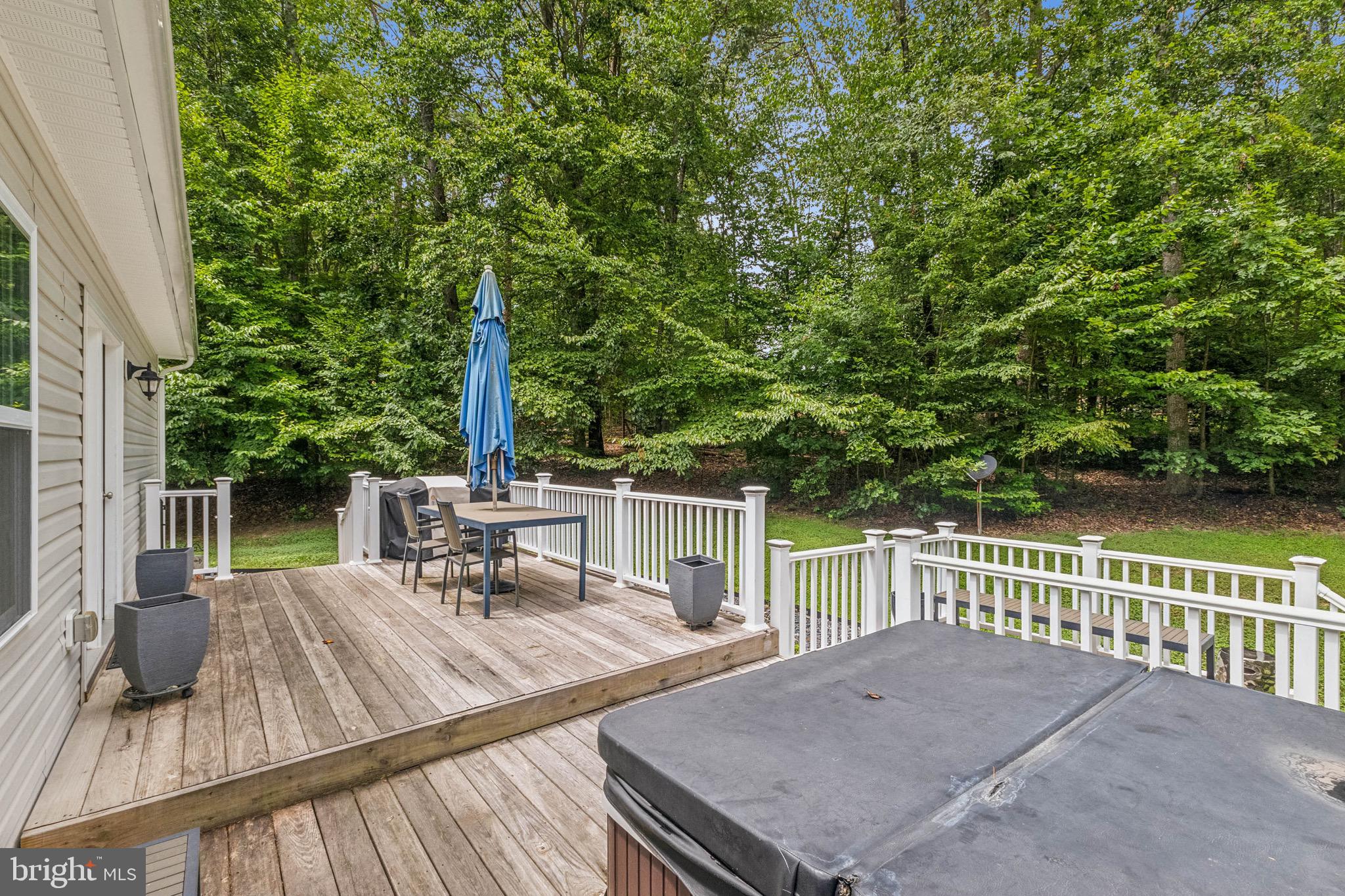 6108 Bills Road Mineral, VA 23117 - Photo 37 of 43 a view of a patio with chairs next to a yard