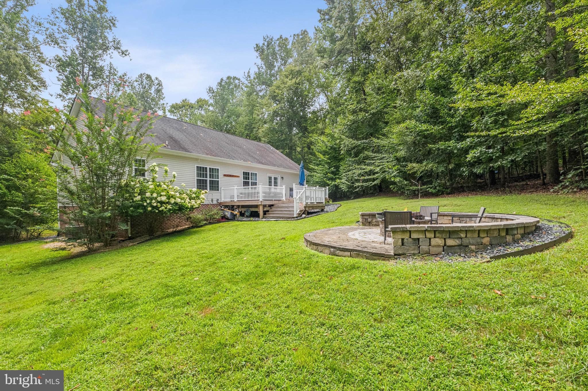 6108 Bills Road Mineral, VA 23117 - Photo 39 of 43 a view of a house with swimming pool and a yard