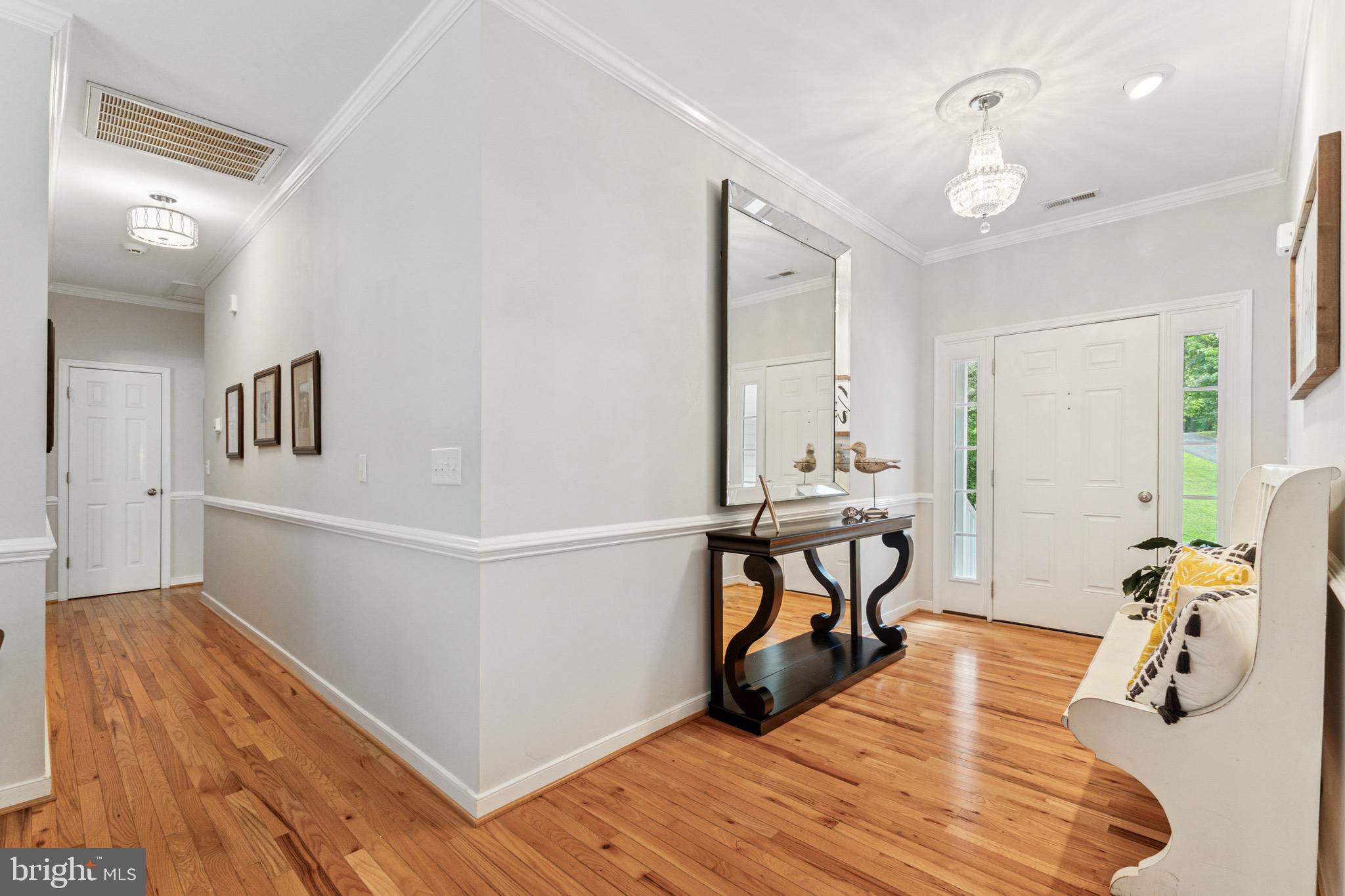 6108 Bills Road Mineral, VA 23117 - Photo 7 of 43 a view of a livingroom with furniture and wooden floor