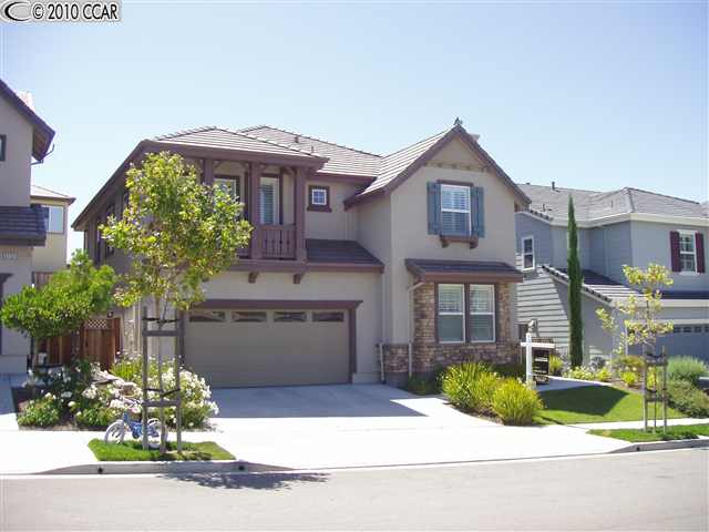 2155 Mornington Lane San Ramon, CA 94582 - Photo 1 of 1 a front view of a house with a yard and potted plants
