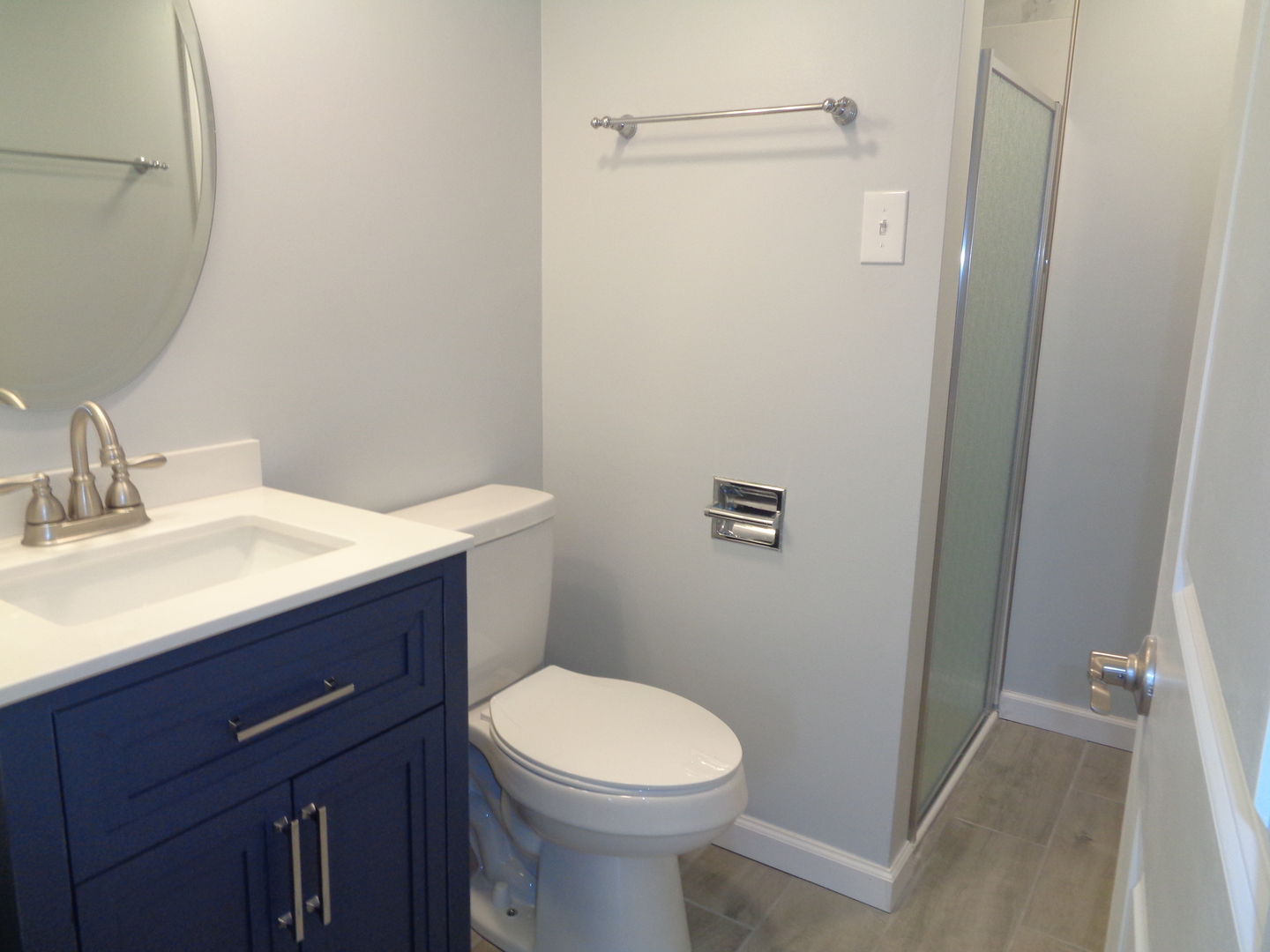 4010 150th Street, Unit 6 Midlothian, IL 60445 - Photo 11 of 13 a bathroom with a sink a toilet and shower
