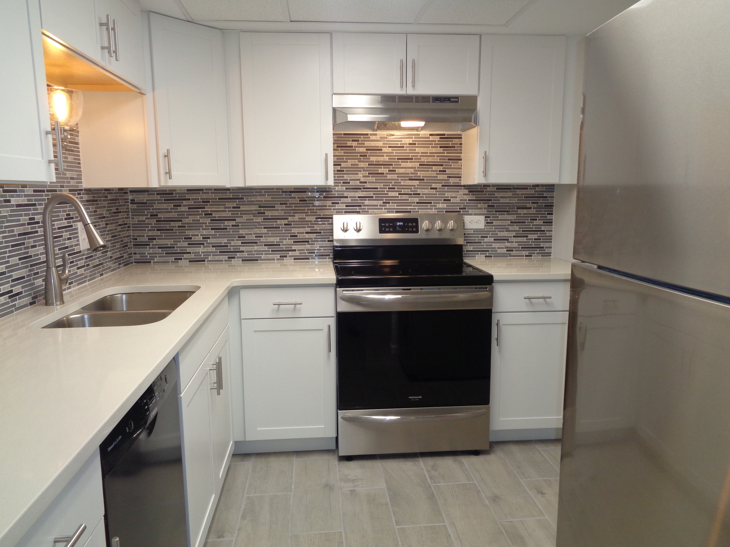 4010 150th Street, Unit 6 Midlothian, IL 60445 - Photo 5 of 13 a kitchen with a stove and a sink