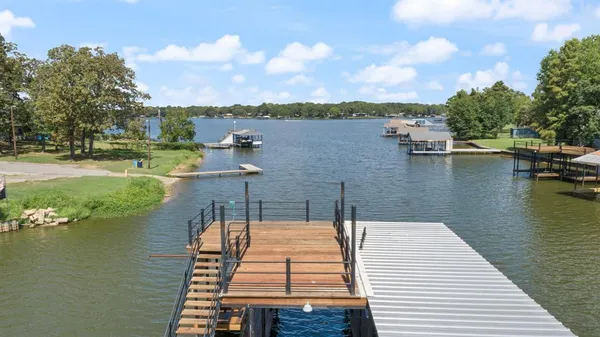 a kitchen with cabinets and window