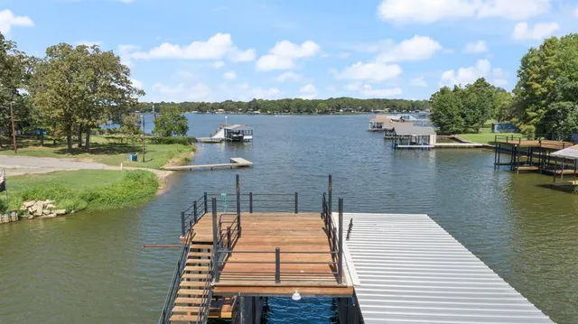 a kitchen with cabinets and window