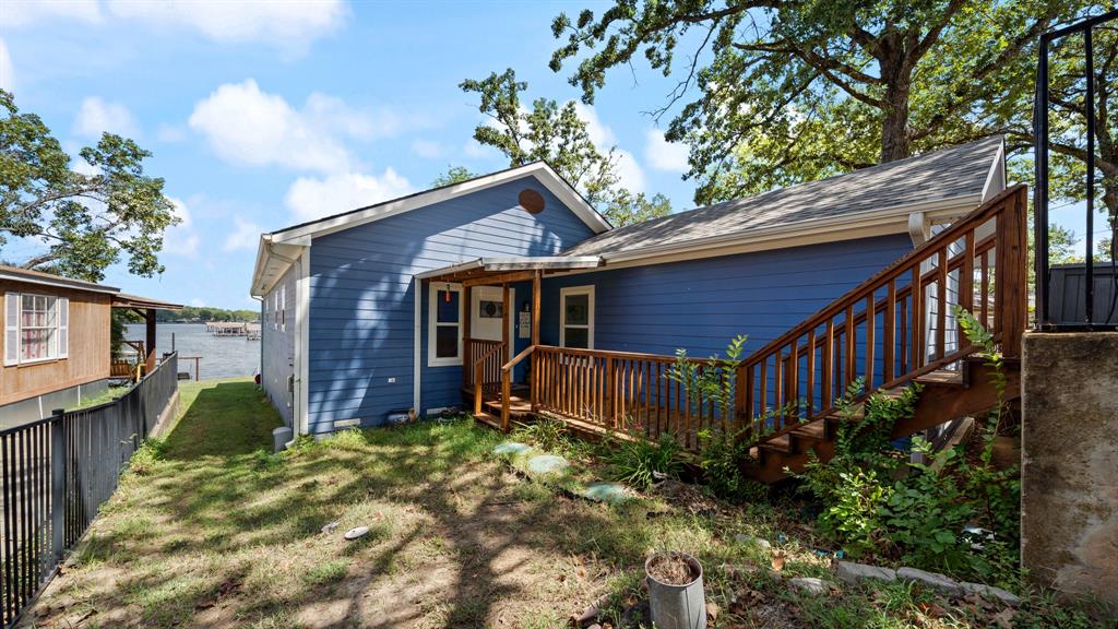 151 Sun Down Trail Mabank, TX 75156 - Photo 3 of 29 a house view with a garden space
