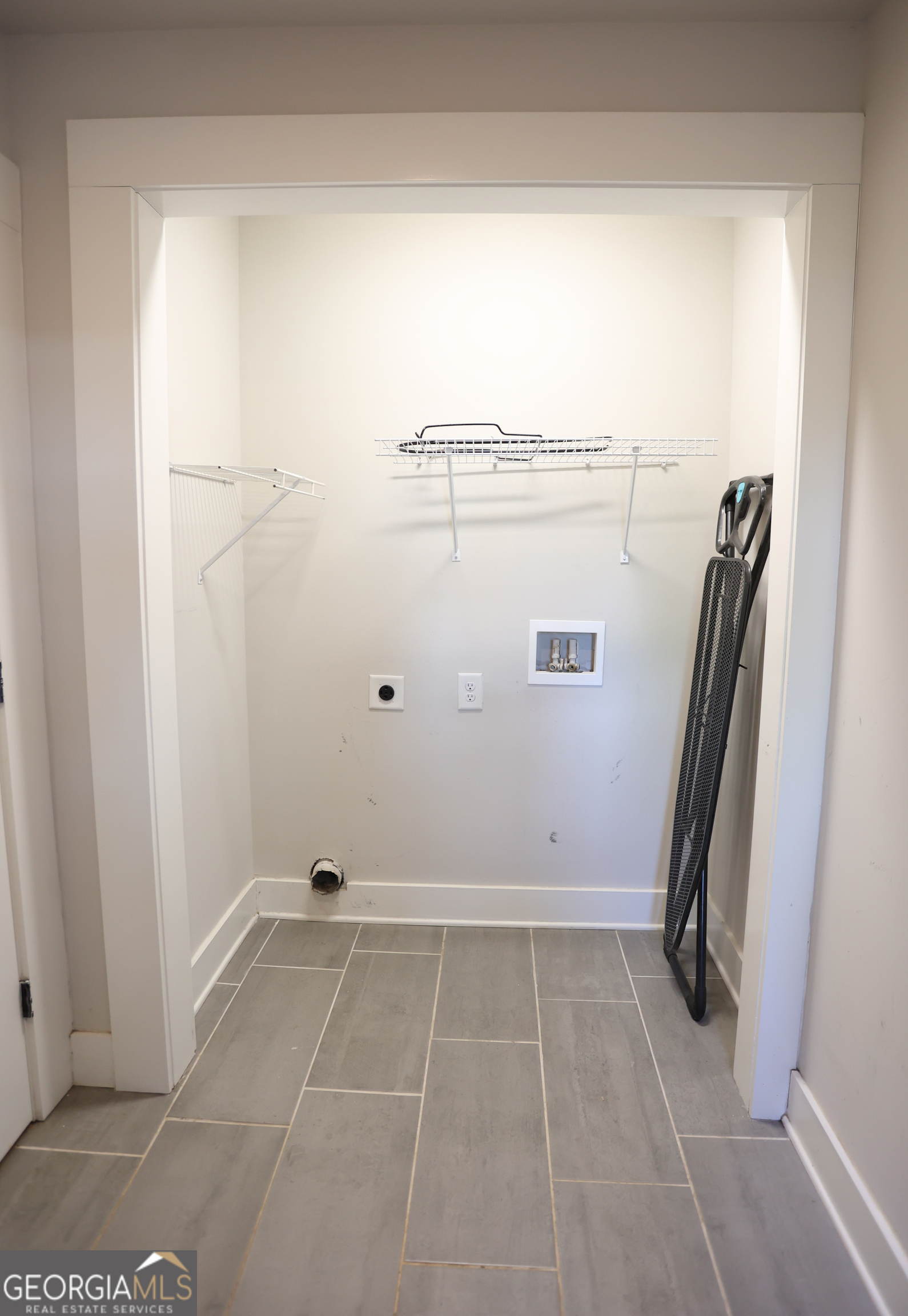 68 Hayes Street Toccoa, GA 30577 - Photo 17 of 33 a view of a room with rack on the wall