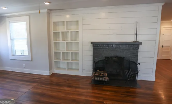 a living room with a fireplace