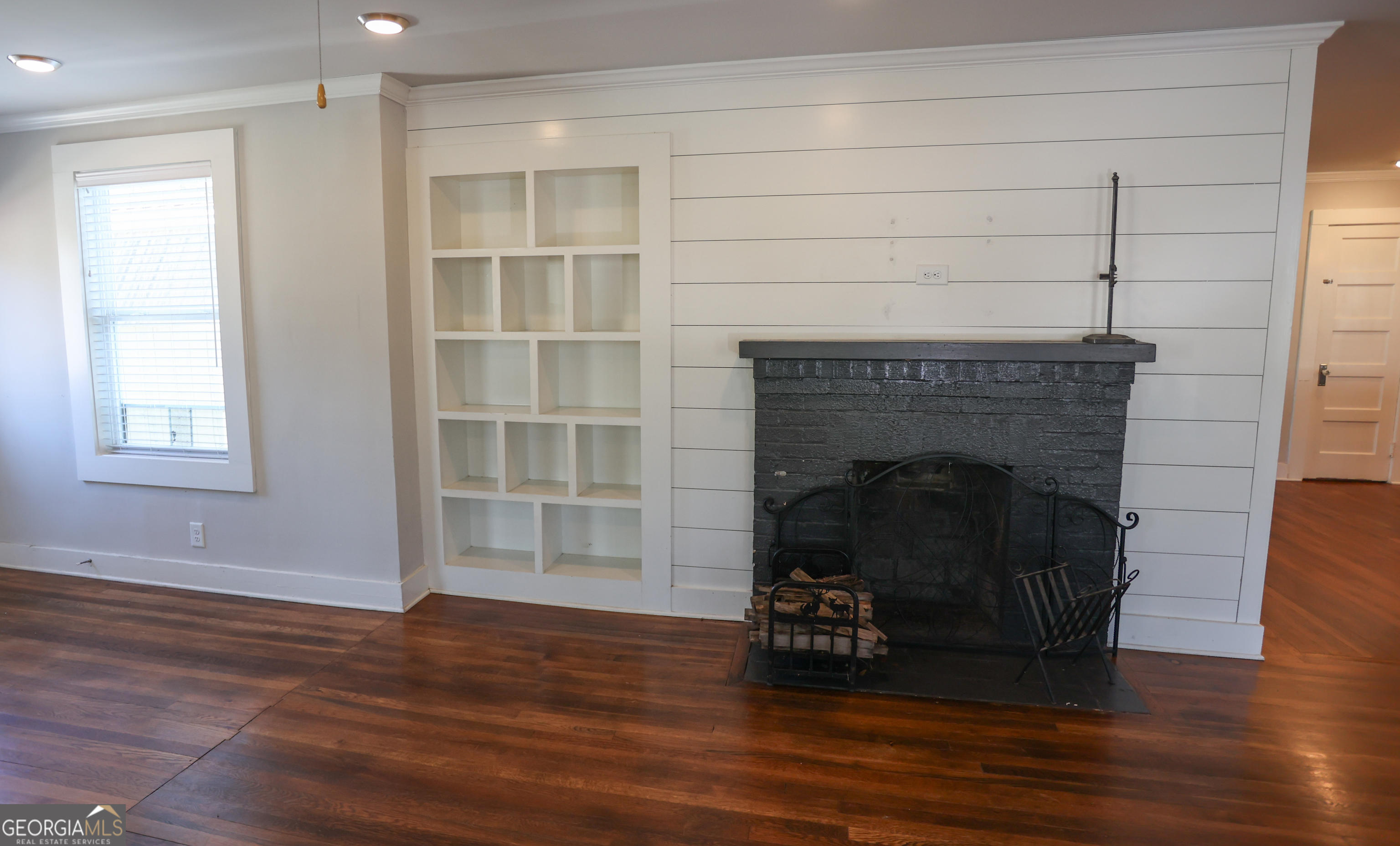 68 Hayes Street Toccoa, GA 30577 - Photo 4 of 33 a living room with a fireplace