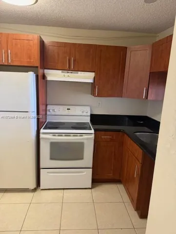 a utility room with washer and dryer