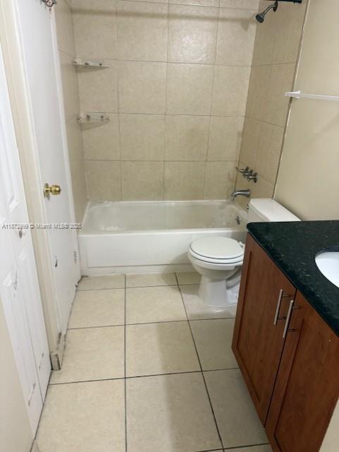 492 Northwest 165th Street, Unit C510 Miami, FL 33169 - Photo 3 of 9 a bathroom with a sink a toilet and shower