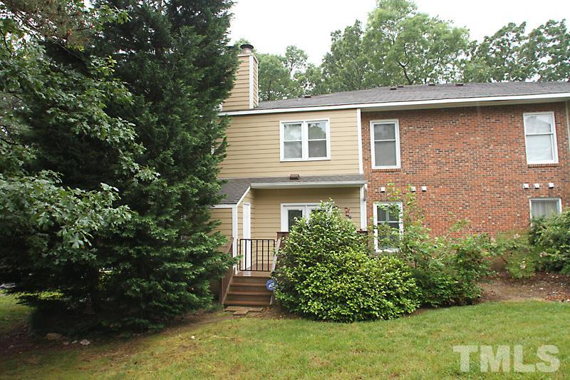 3405 Mill Run Raleigh, NC 27612 - Photo 12 of 12 a front view of a house with garden