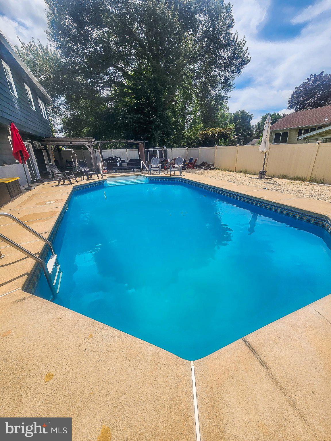 129 Michigan Road Pennsville, NJ 08070 - Photo 24 of 25 Inviting poolside retreat awaits you.