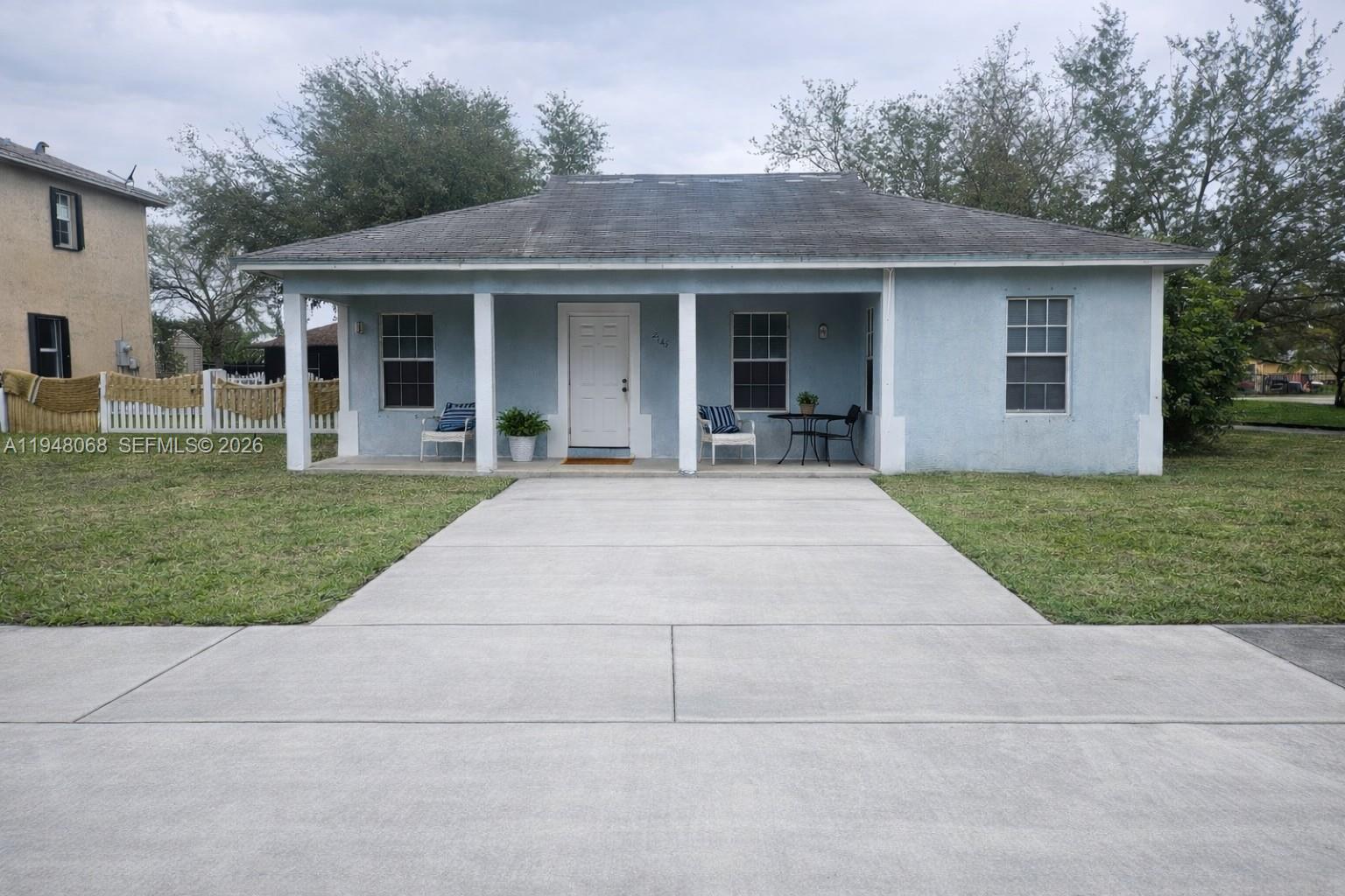 a front view of house with yard