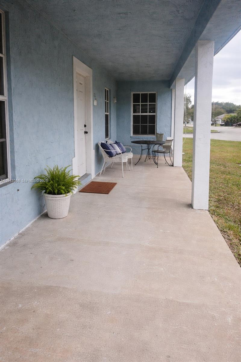 2145 Northwest 68th Terrace Miami, FL 33147 - Photo 3 of 12 a view of kitchen with furniture and a potted plant